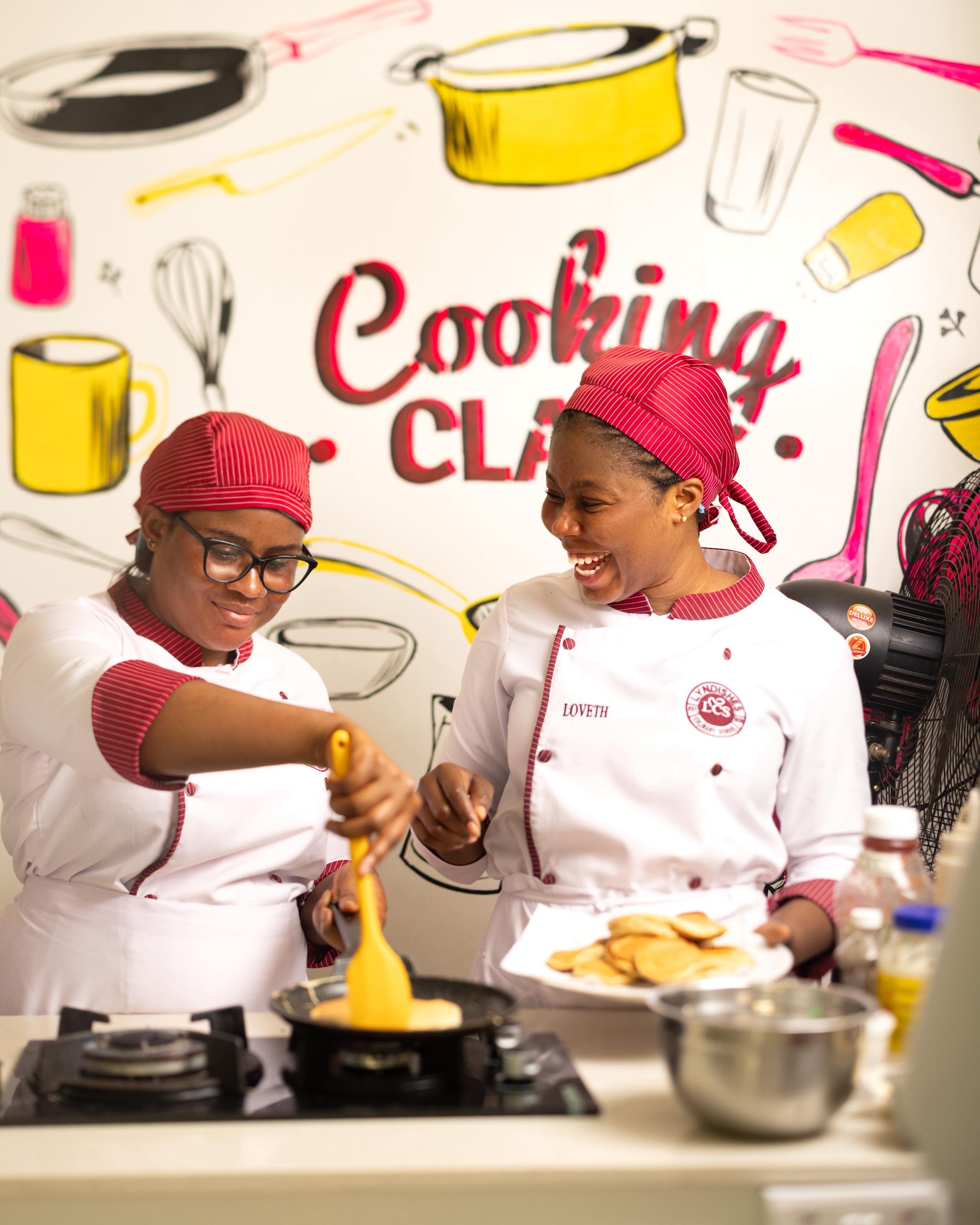 Students learning in the Lyndishes kitchen